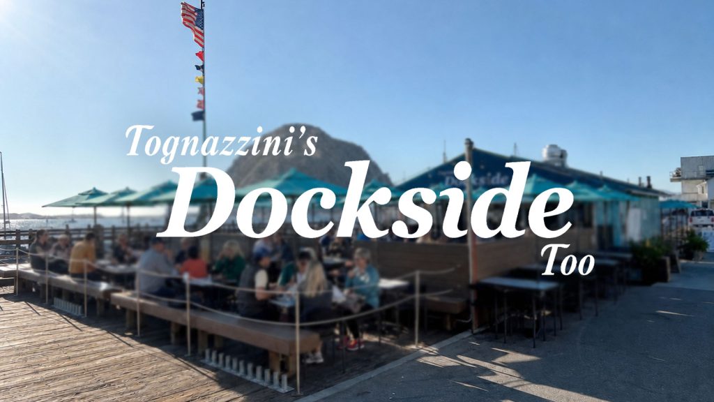 Outdoor tables and live music on the Tognazzini's Dockside Too patio beside the North T-pier in Morro Bay.
